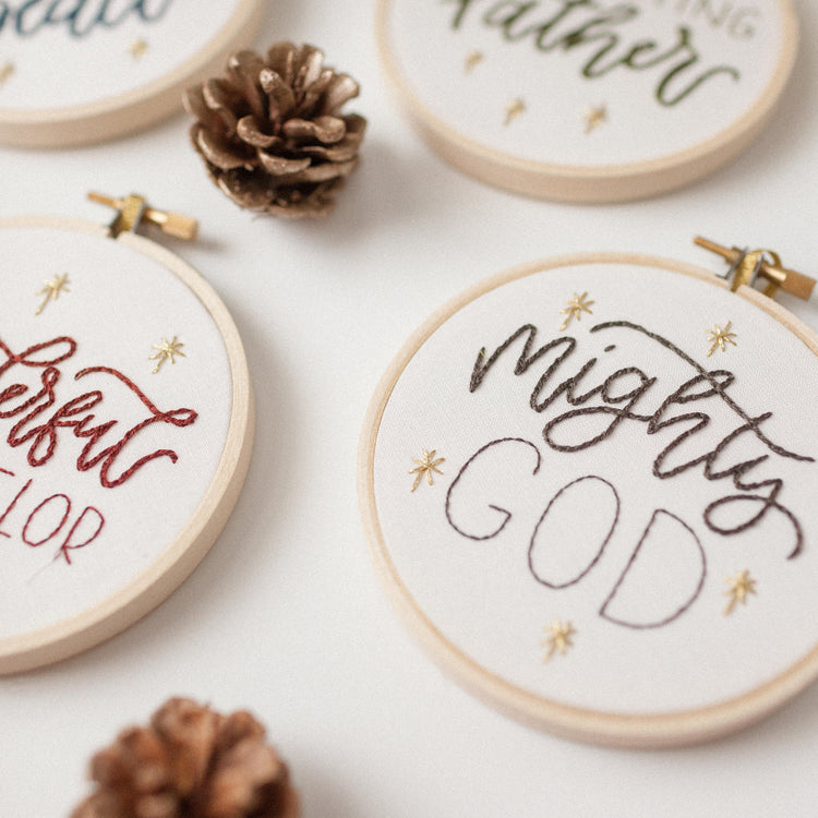 Angled detail of the Mighty God Advent ornament showing the stitch texture