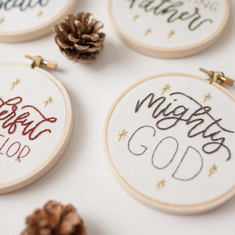 Angled detail of the Mighty God Advent ornament showing the stitch texture