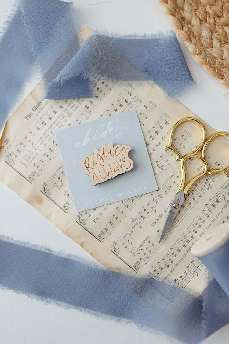 Rejoice Always magnetic needle minder on vintage sheet music