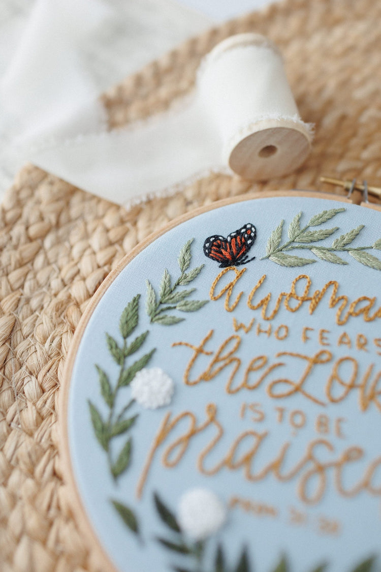 Close-up of the monarch butterfly and hand-lettering detail