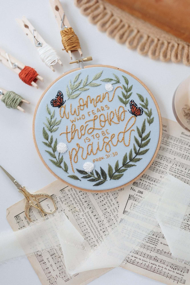 Proverbs 31 hoop with blush ribbon, scissors and vintage sheet music