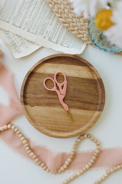Decorative stork-shaped embroidery scissors in a fresh pop of color