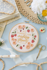 Finished Psalm 118 'His steadfast love endures forever' hand embroidery design in a hoop