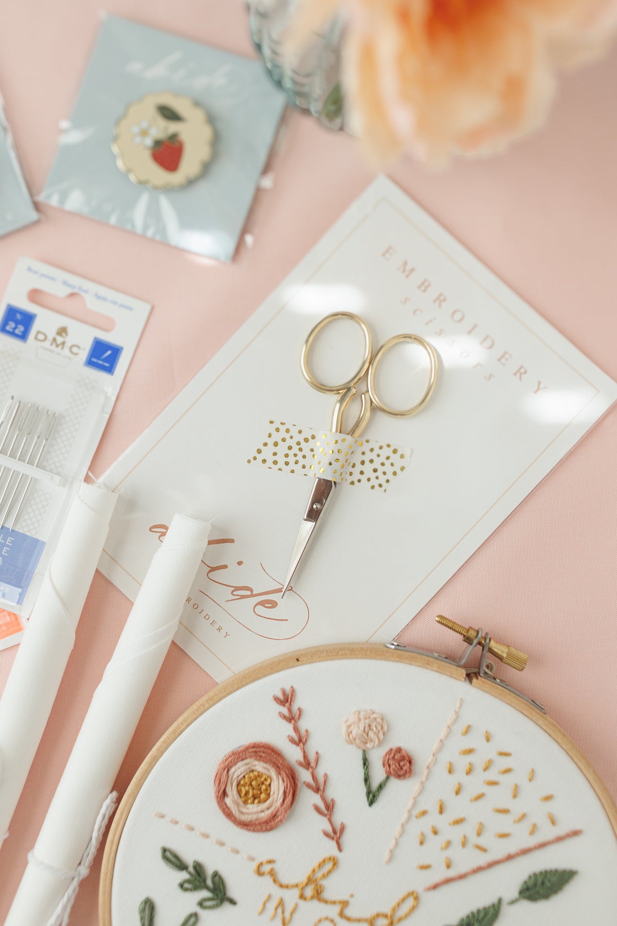 Strawberry needle minder, gold embroidery scissors and Snow fabric with the practice hoop
