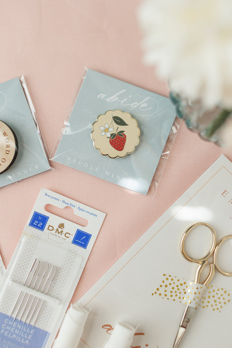 Strawberry enamel needle minder, gold scissors and DMC needle packs