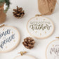 Close-up of the Everlasting Father ornament stitched in olive green