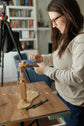 Embroidery hoop stand in use — hands-free stitching at a desk