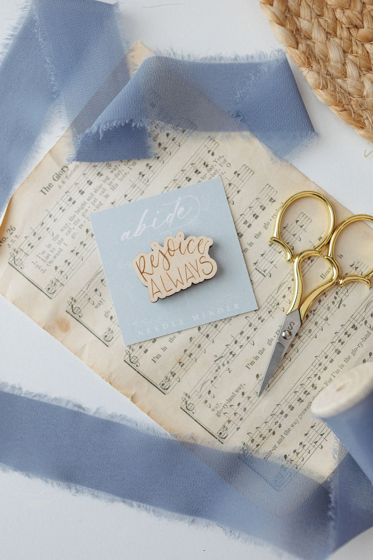 Rejoice Always magnetic needle minder on vintage sheet music