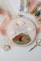 In Christ Alone empty-tomb embroidery hoop with floss and scissors