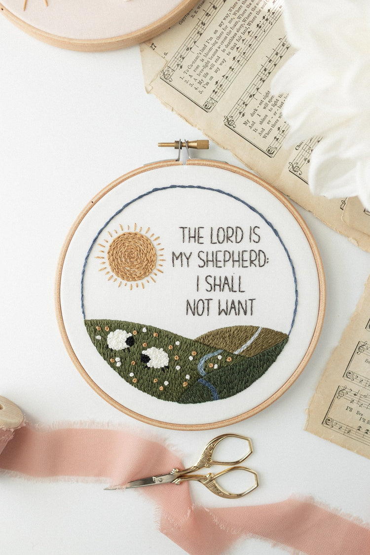 Psalm 23 embroidery hoop with blush ribbon and gold scissors