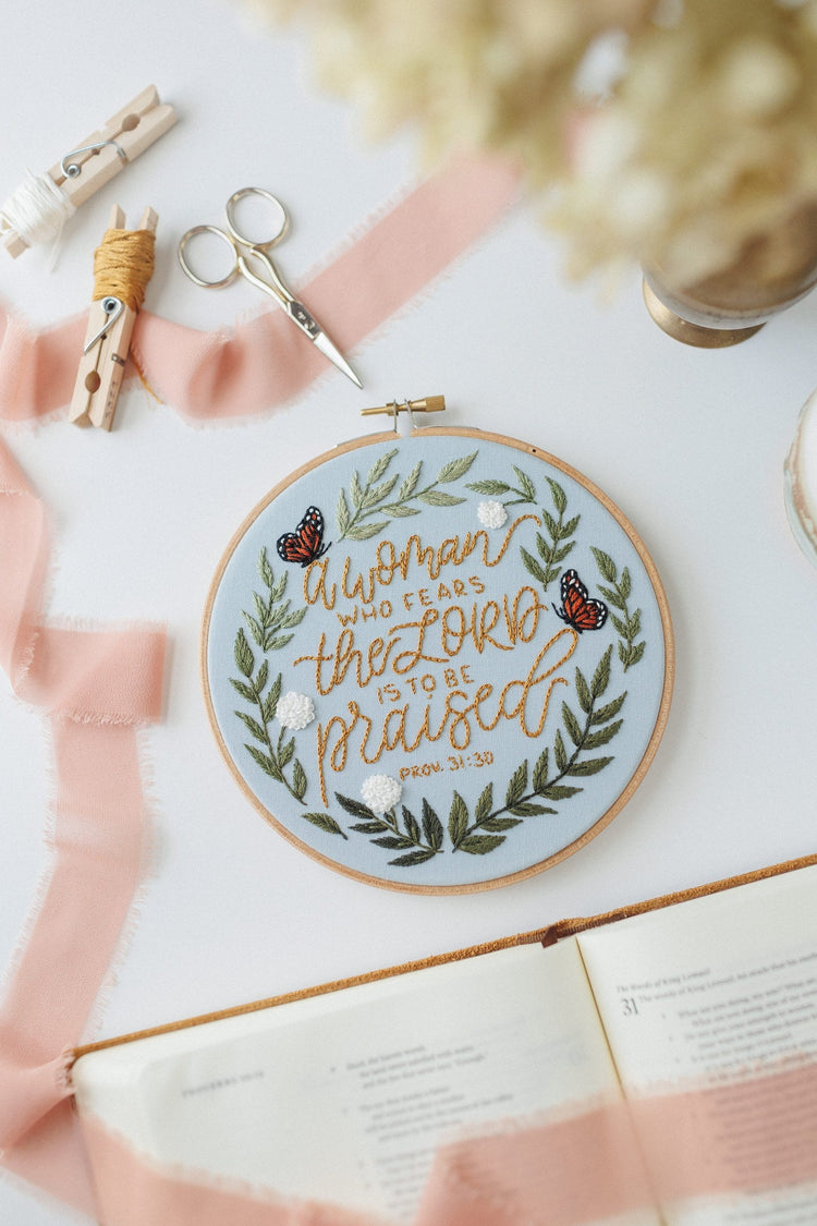 A Woman Who Fears the Lord hoop styled with ribbon and sheet music