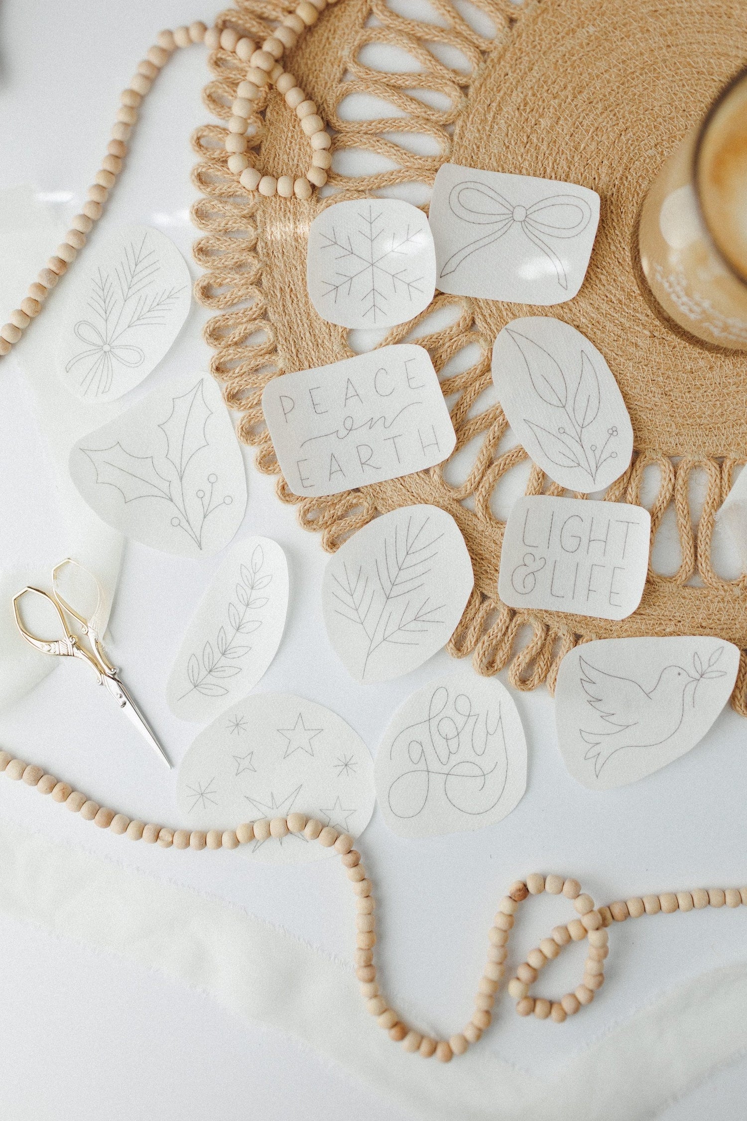 Peace on Earth stick and stitch design sheets laid out