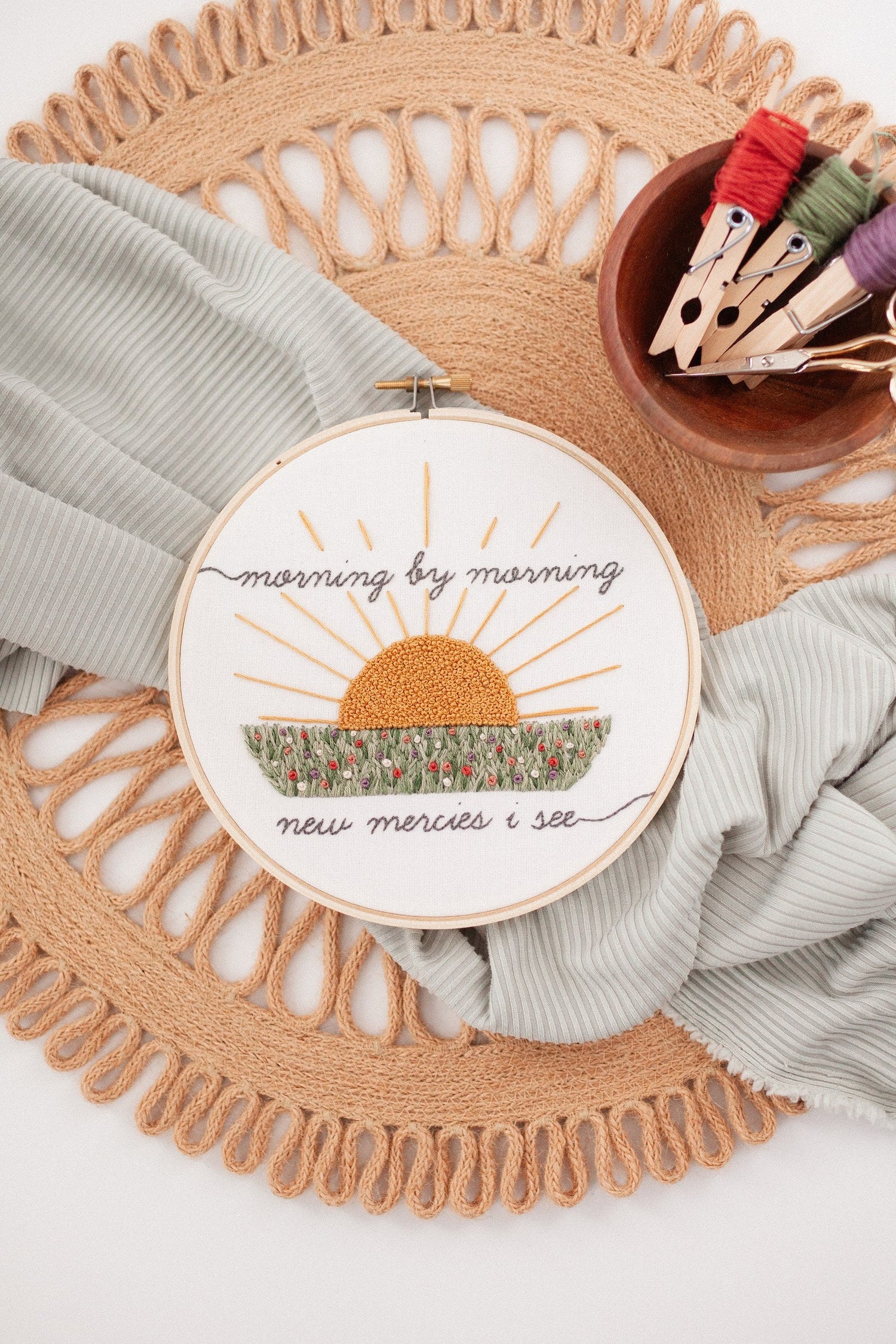 Morning by Morning sunrise embroidery hoop with floss bobbins