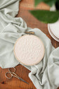 Close-up of the Soli Deo Gloria embroidery hoop