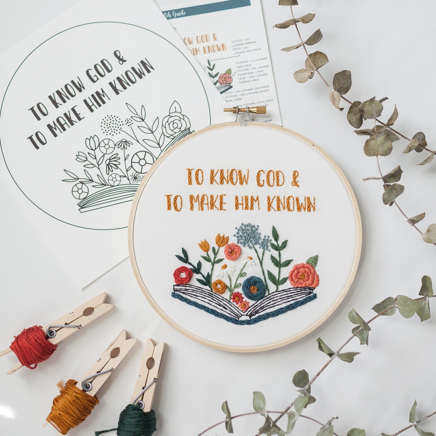 Finished hoop shown beside the printable pattern and colour-and-stitch guide from the digital download