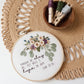 Though He Slay Me, Yet Will I Hope in Him — Job 13:15 floral embroidery hoop on a jute placemat